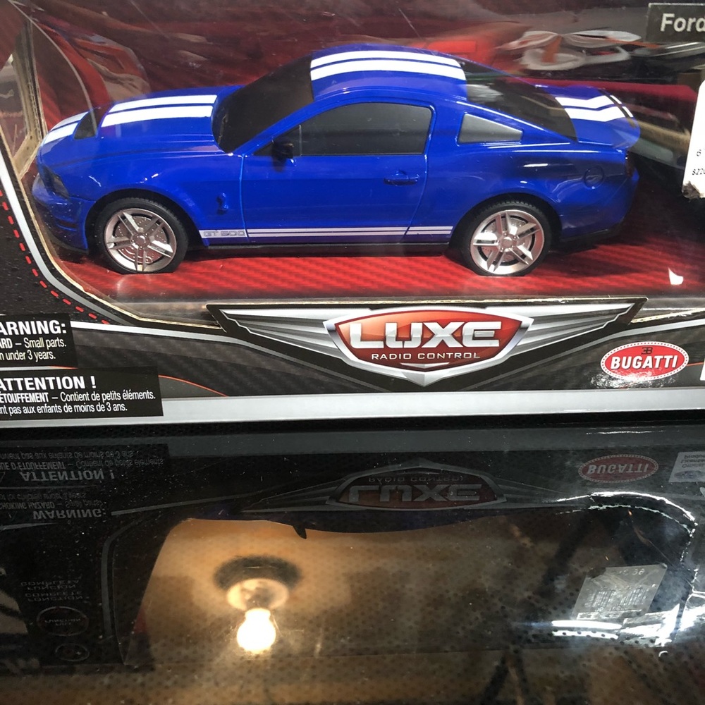 UNOPENED. REMOTE MUSTANG